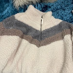 Warm fuzzy pull over jacket